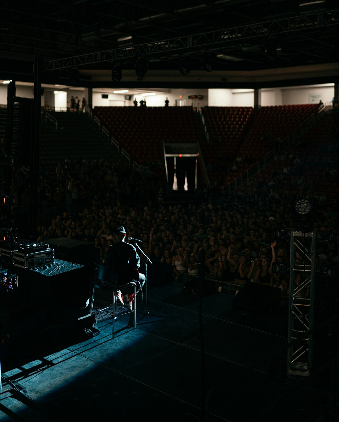 Live show stage with lighting and audience seating